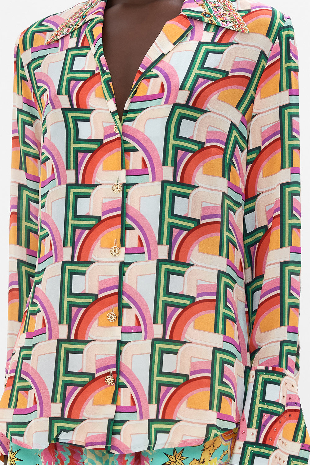 Detail view of model wearing CAMILLA printed silk shirt in An Italian Welcome print