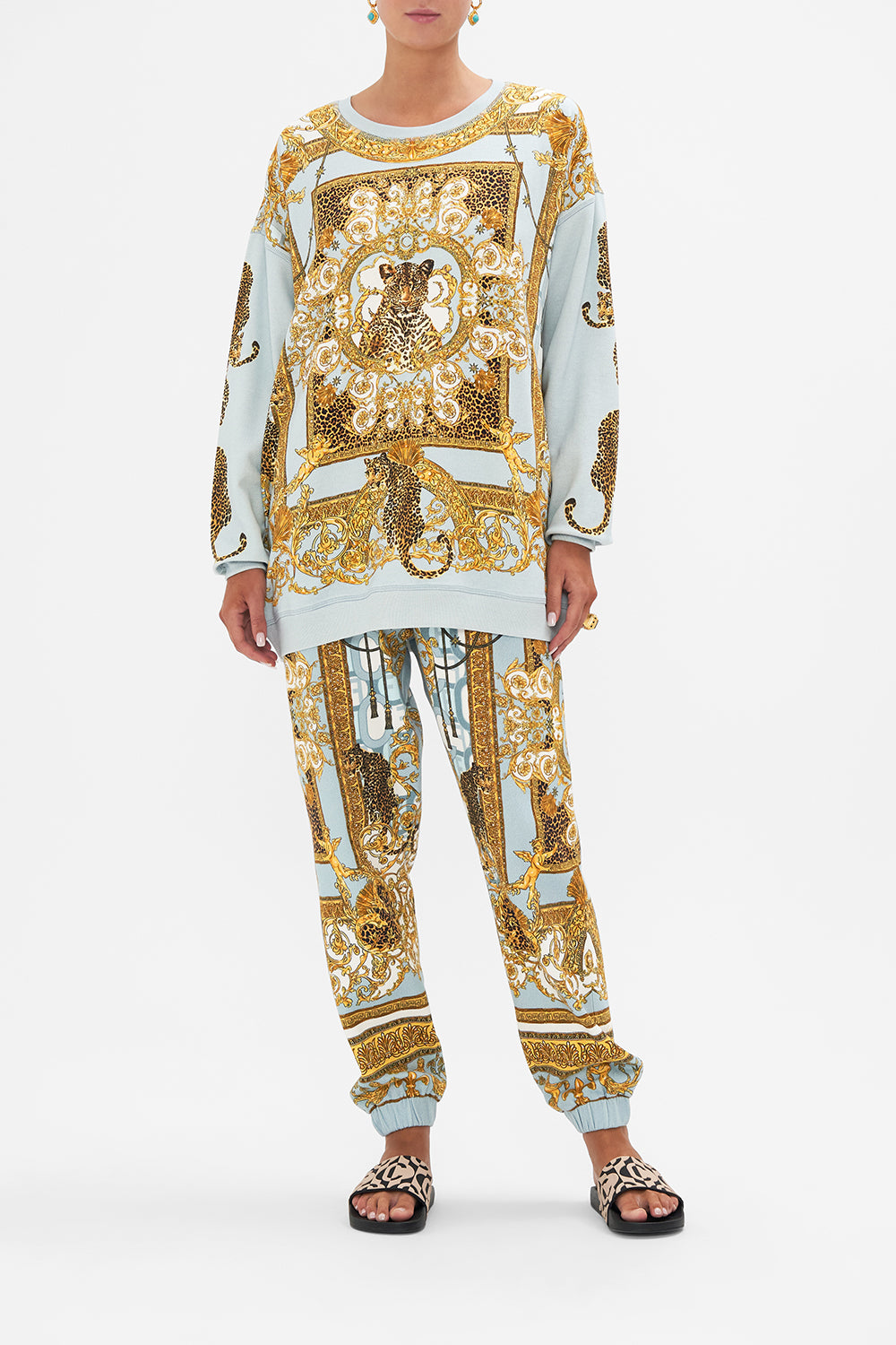 Front view of model wearing CAMILLA oversized sweater in Palazzo Pride print