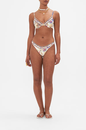 Front view of model wearing CAMILLA floral bikini top in Friends With Frescos print