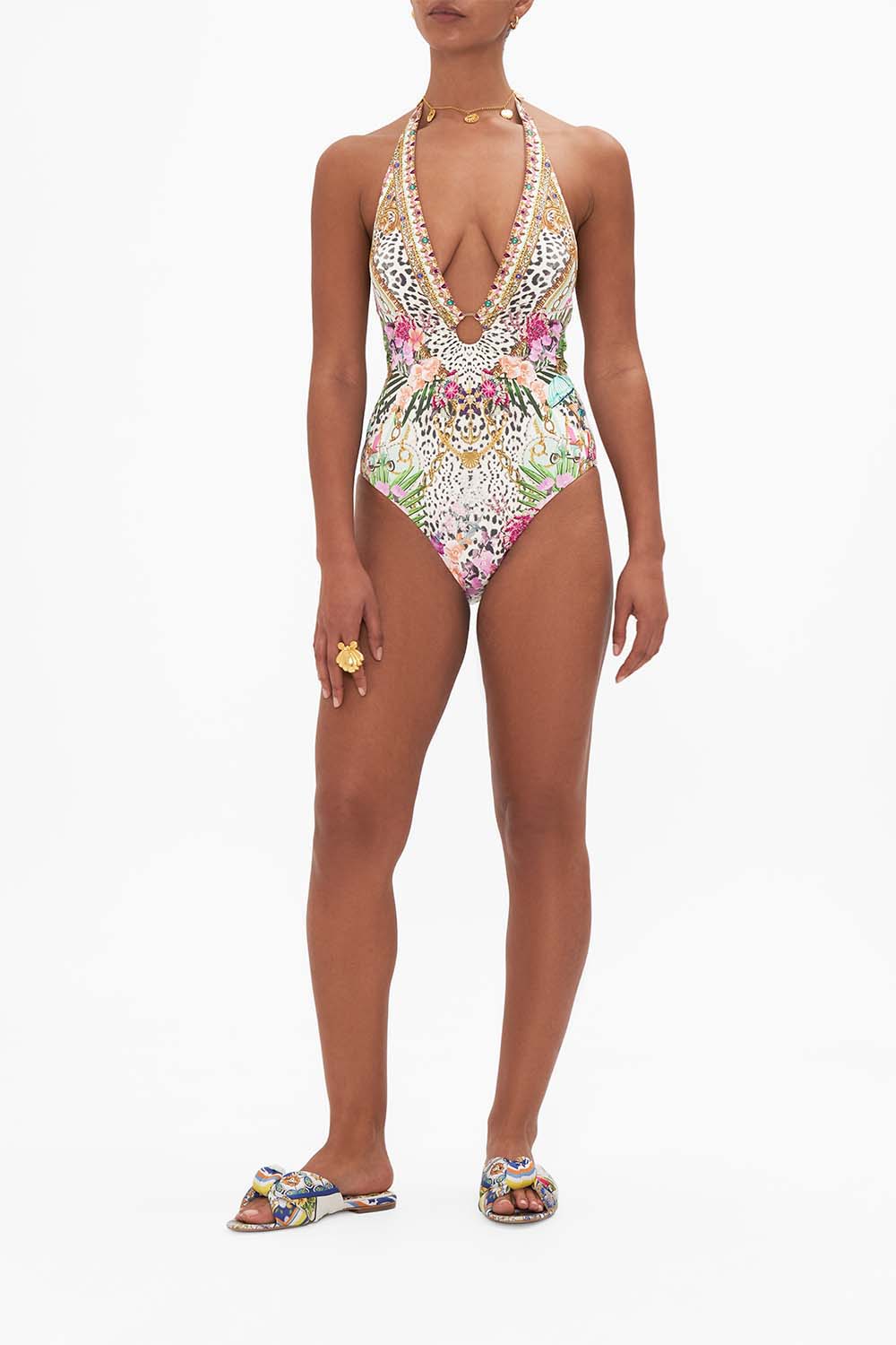 Front view of model wearing CAMILLA swimwear one piece swimsuit with ring detail in Dear Amore Mio print