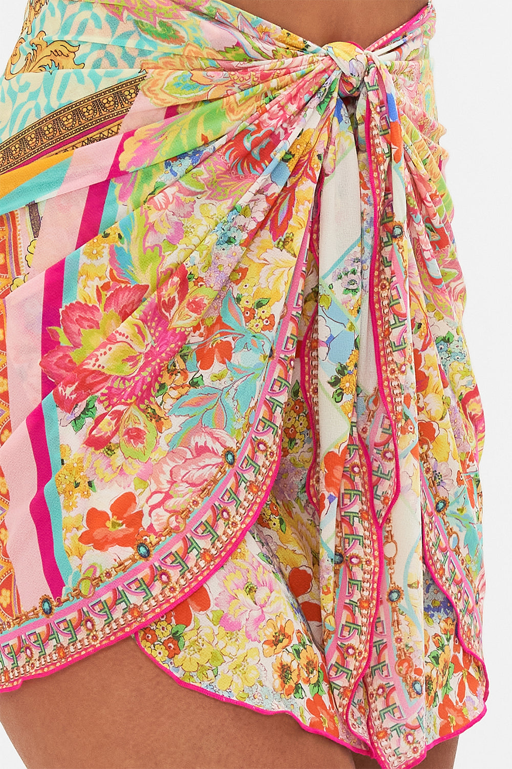 Detail view of model wearing CAMILLA resortwear short sarong in An Italian Welcome print
