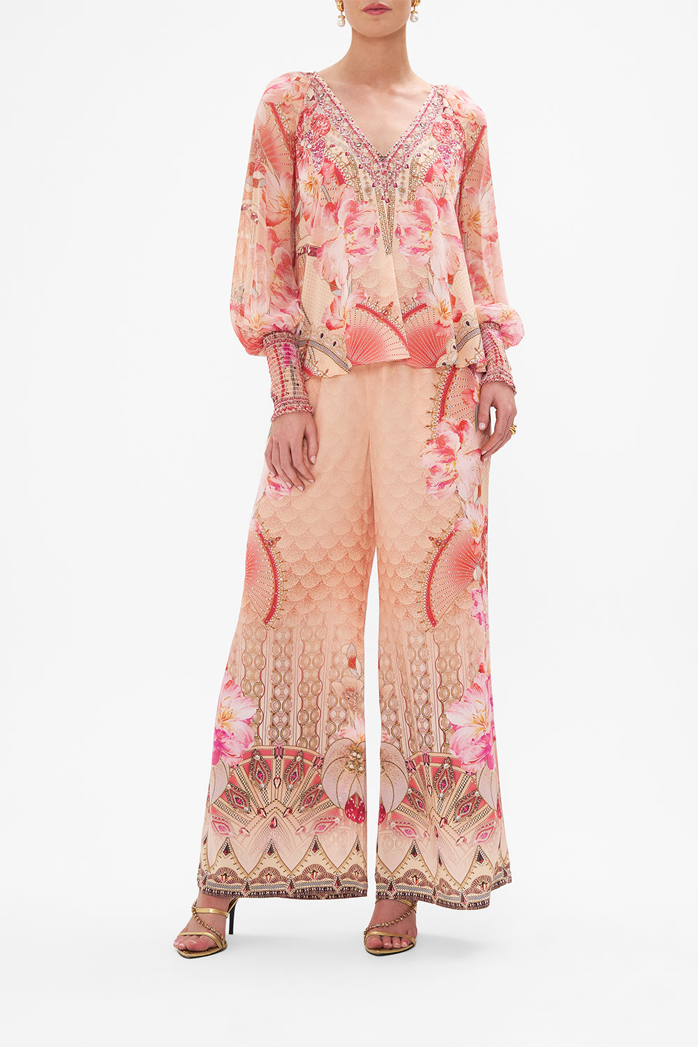 Front view of model wearing CAMILLA silk blouse in Adore Me print