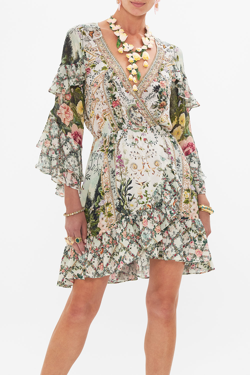 Crop view of model wearing CAMILLA silk wrap dress in Renaissance Romance print