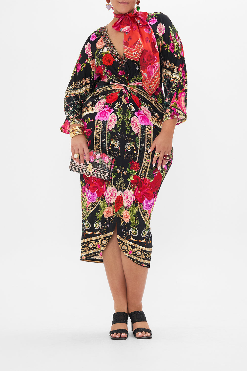 Front view of curvy model wearing CAMILLA plus size floral midi dress in Reservation For  Love print 