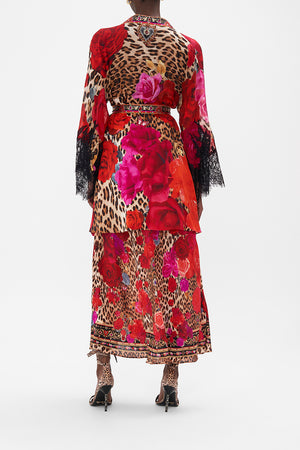 Back view of model wearing CAMILLA silk kimono jacket in Heart Like A Wildflower print 