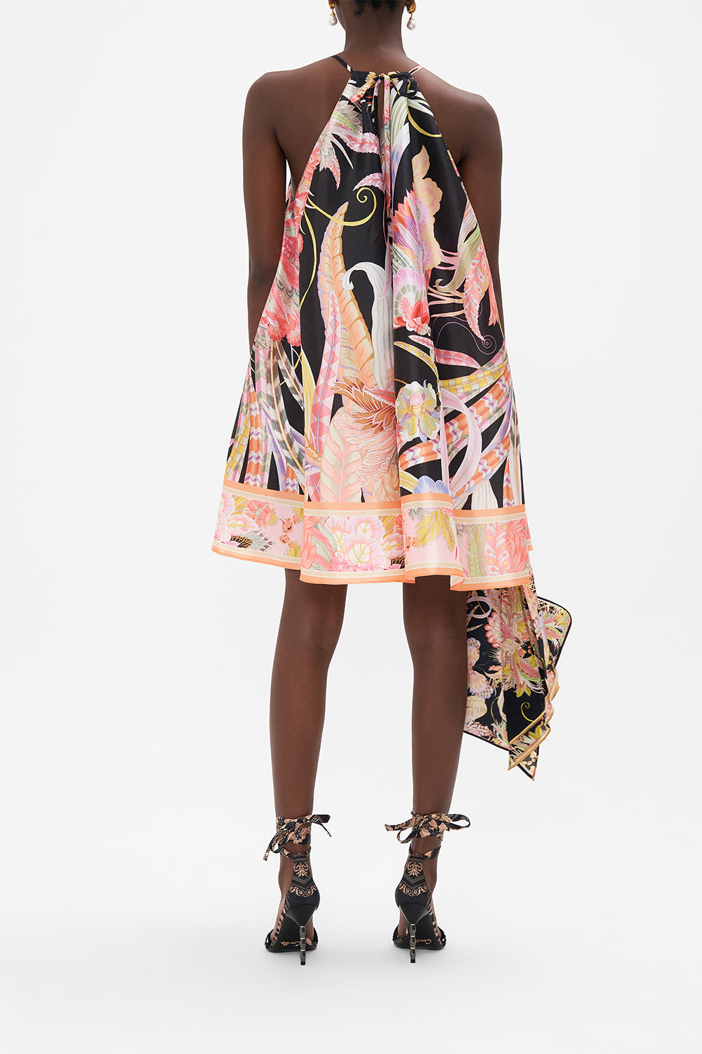 Back view of model wearing CAMILLA trapeze mini dress in Lady of The Moon print