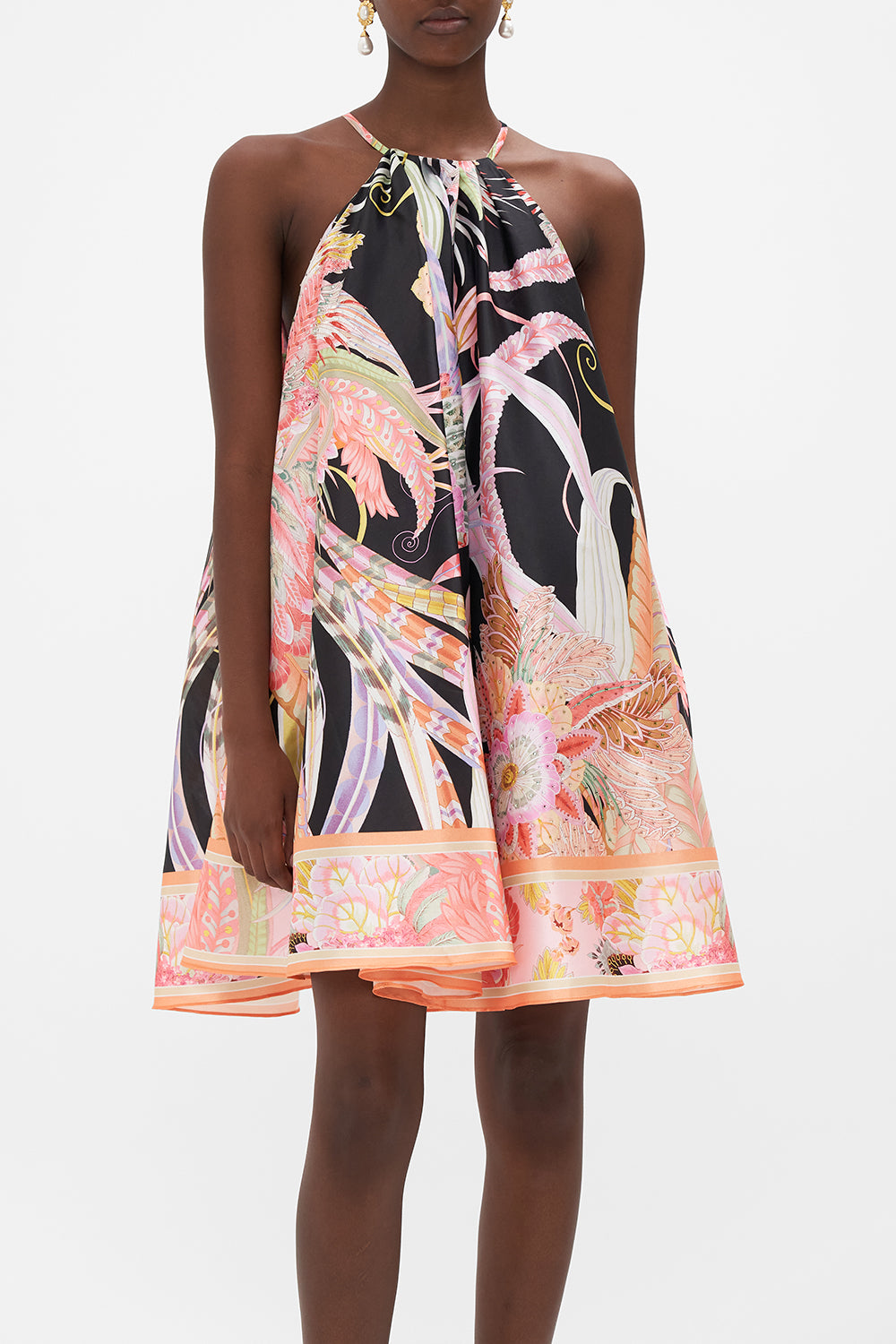 Crop view of model wearing CAMILLA trapeze mini dress in Lady of The Moon print