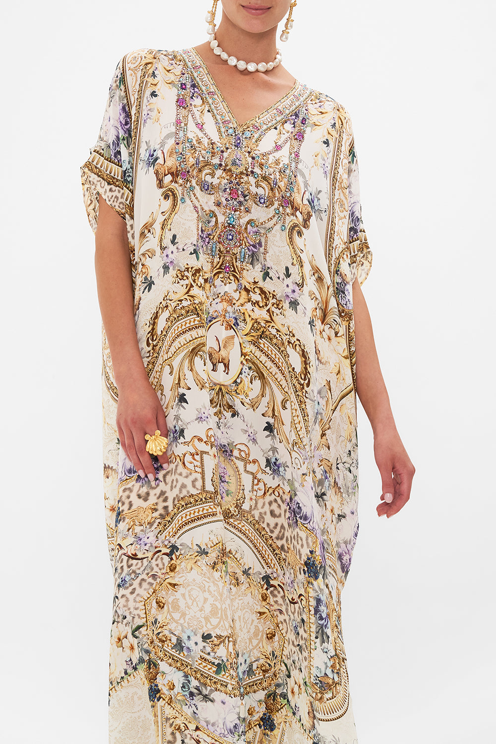 Crop view of model wearing CAMILLA resortwear silk kaftan in Palazzo playdate print 