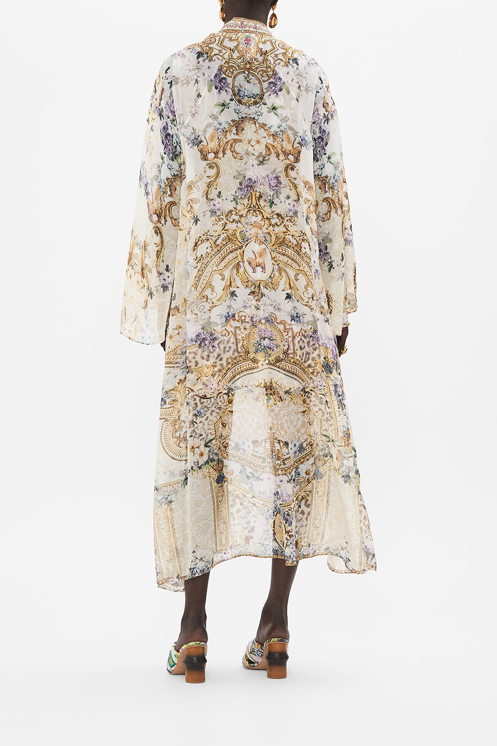 Back view of model wearing CAMILLA silk robe in Palazzo Playdate print 
