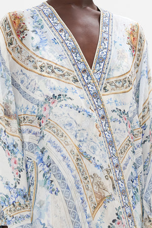 Detail view of model wearing CAMILLA silk jacket in Season Of The Sirenprint 