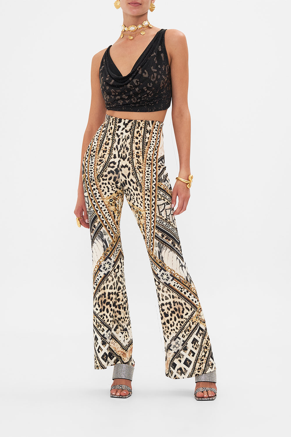 Front view of model wearing CAMILLA flare pant in Mosaic Muse print