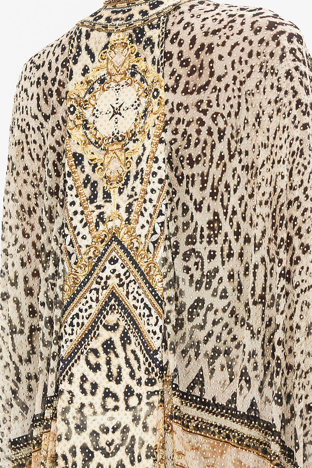 Detail view of model wearing CAMILLA luxury silk jacket in Mosaic Muse print