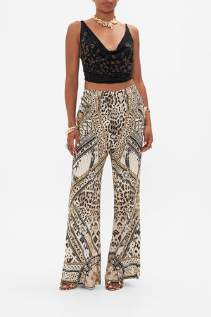 Front view of model wearing CAMILLA silk animal print pants in Mosaic Muse 