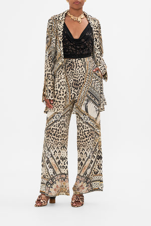 Style view of model wearing CAMILLA silk animal print pants in Mosaic Muse 