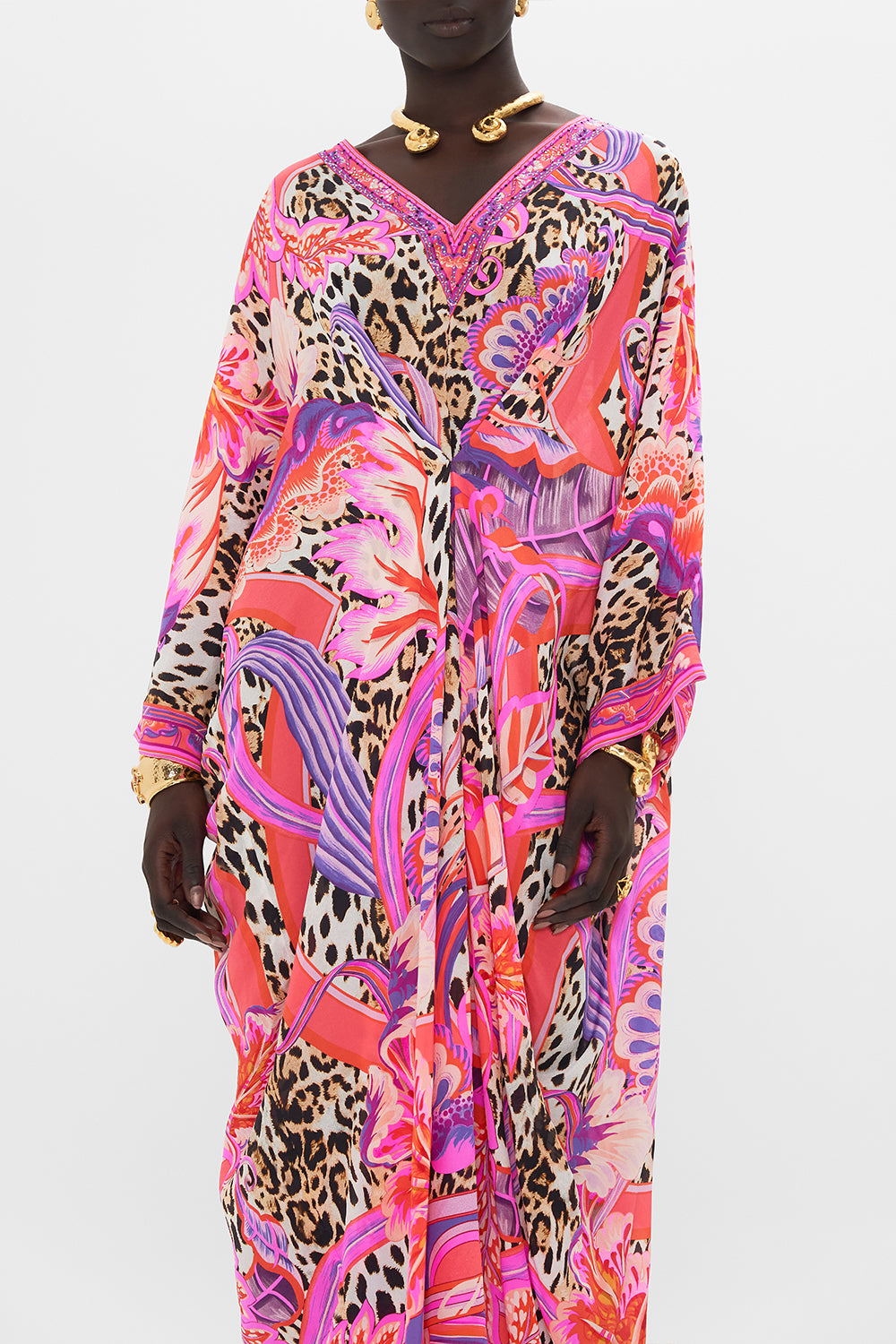 Crop view of model wearing CAMILLA designer resortwear kaftan in Viola Vintage print 