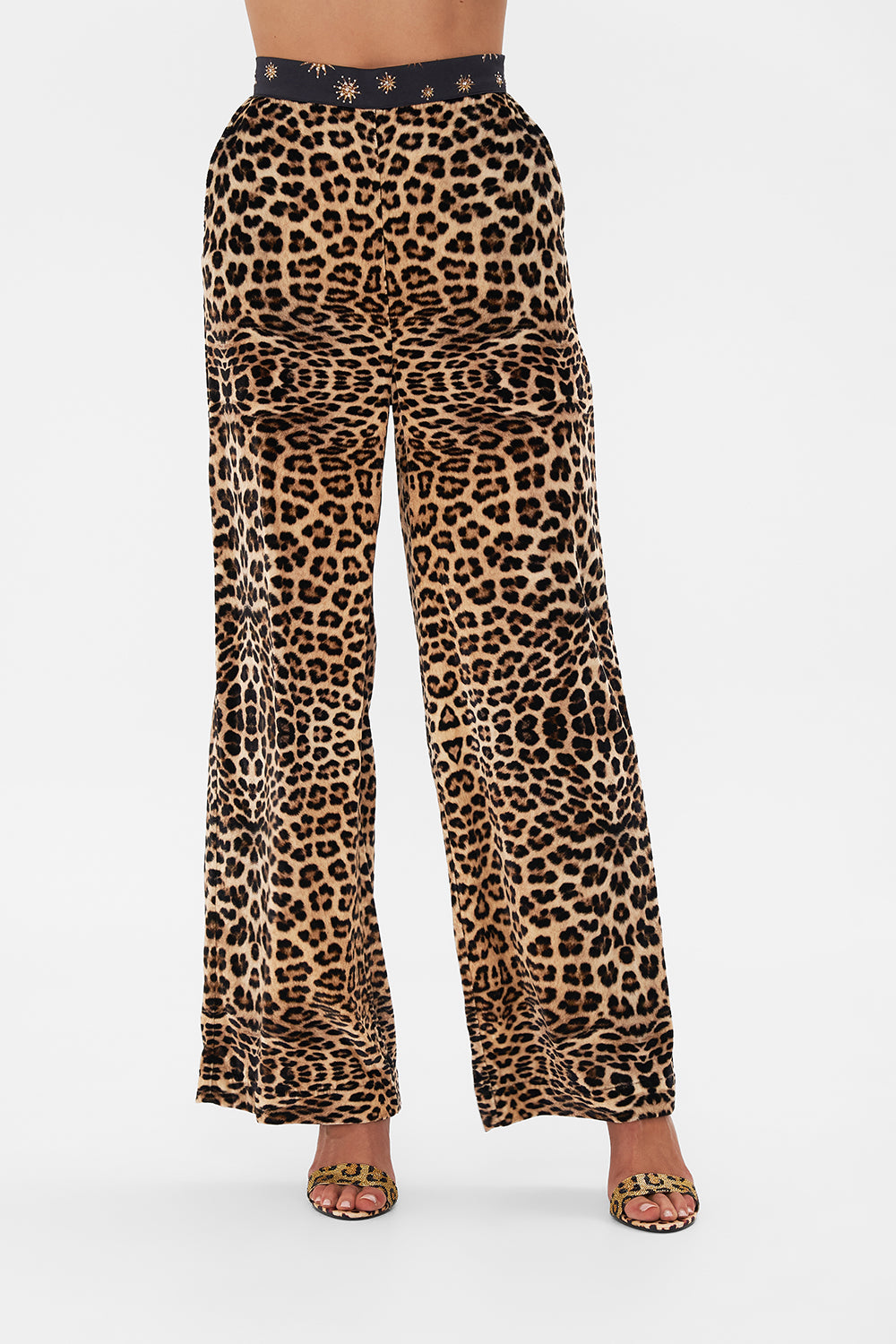 Detail view of model wearing CAMILLA silk pants in Soul of A Star Gazer print 