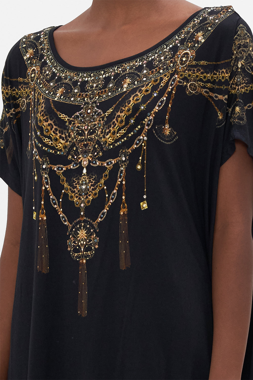 Detail view of model wearing CAMILLA luxury graphic tee in Masked At Moonlight print