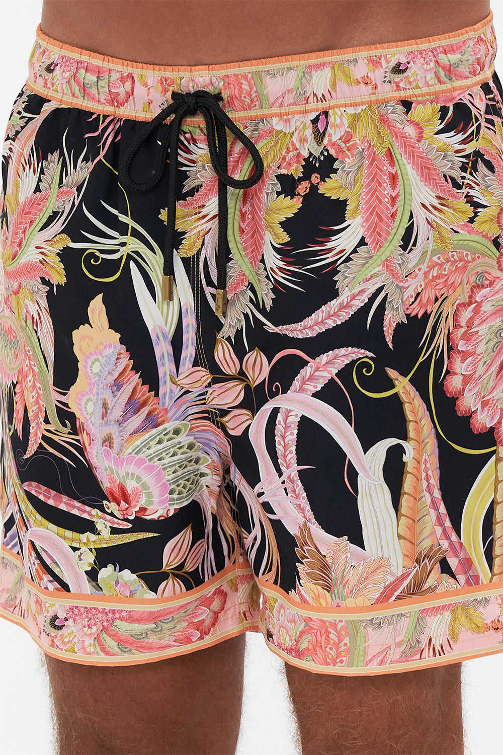 Detail view of model wearing Hotel franks by CAMILLA mens boardshorts in Lady of The Moon print