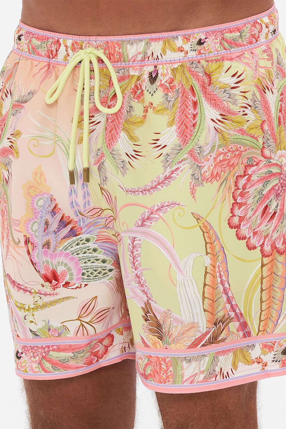 Detail view of model wearing Hotel Franks by CAMILLA mens luxury boardshorts in Cosmic Tuscan print