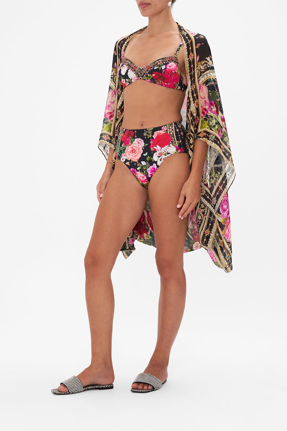 Side view of model wearing CAMILLA floral silk shrug in Reservation for Love print 