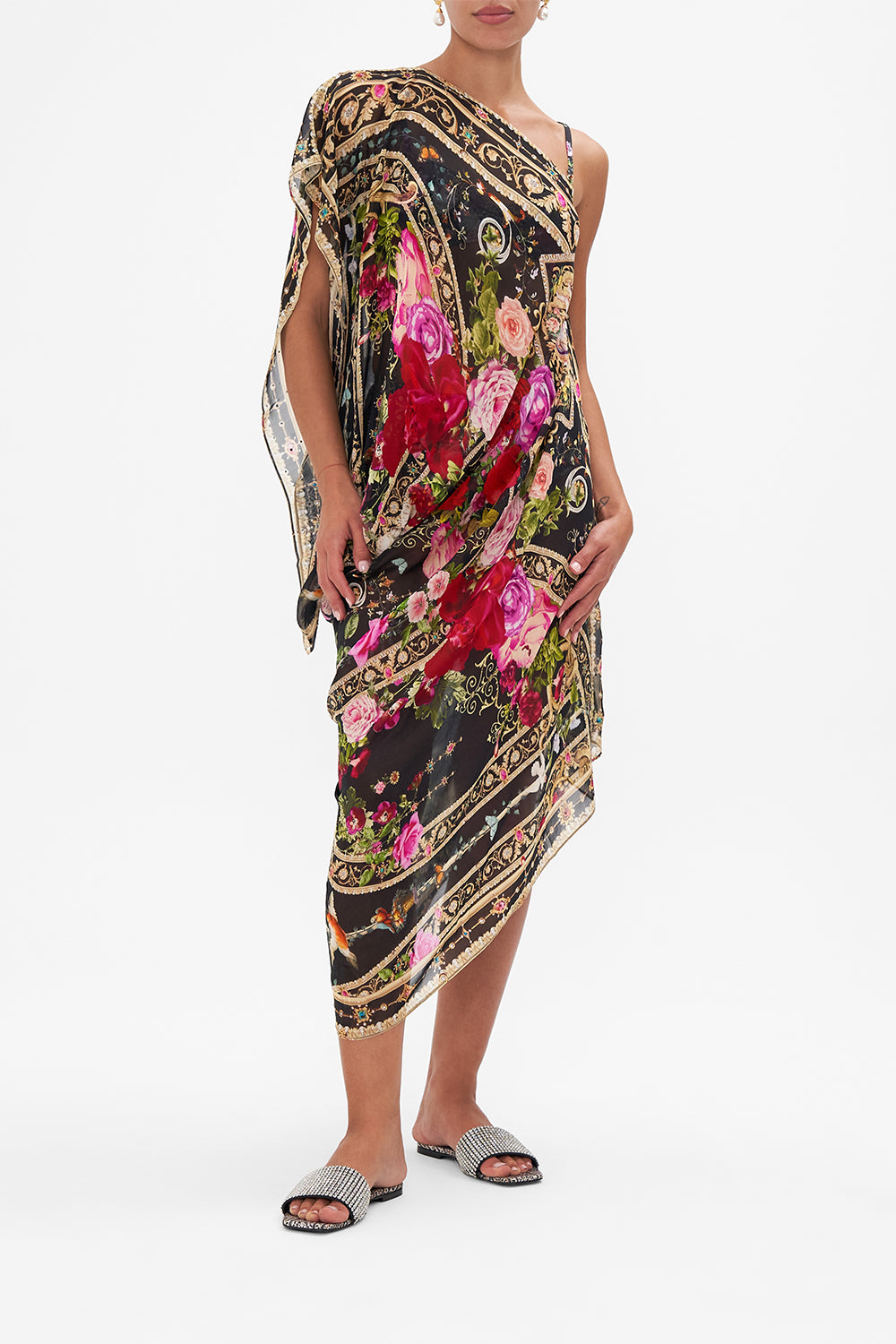 Detail view of model wearing CAMILLA floral silk shrug in Reservation for Love print 