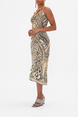 Side view of model wearing CAMILLA bias silk dress in Mosaic Muse print
