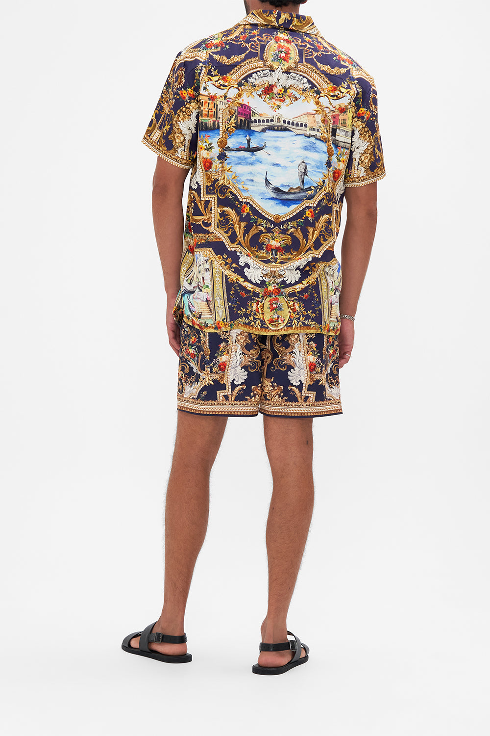 Back view of model wearing Hotel Franks By CAMILLA mens short sleeve camp collared shirt in  Venice Vignette print 