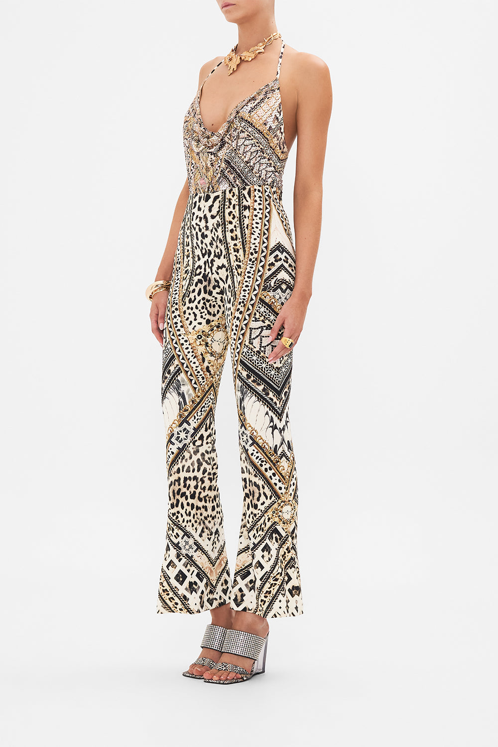 Side view of model wearing CAMILLA animal print bodysuit in Mosaic Muse