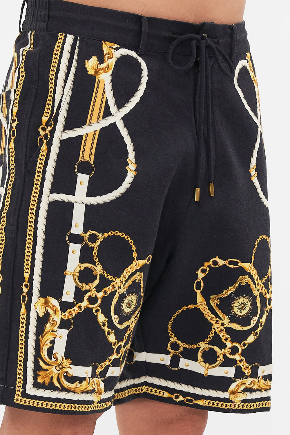 Detail view of model wearing Hotel Franks By CAMILLA mens boardshort in Coast To Coast print 