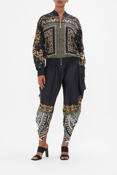 Front view of model wearing CAMILLA silk bomber jacket in Duomo Dynasty print