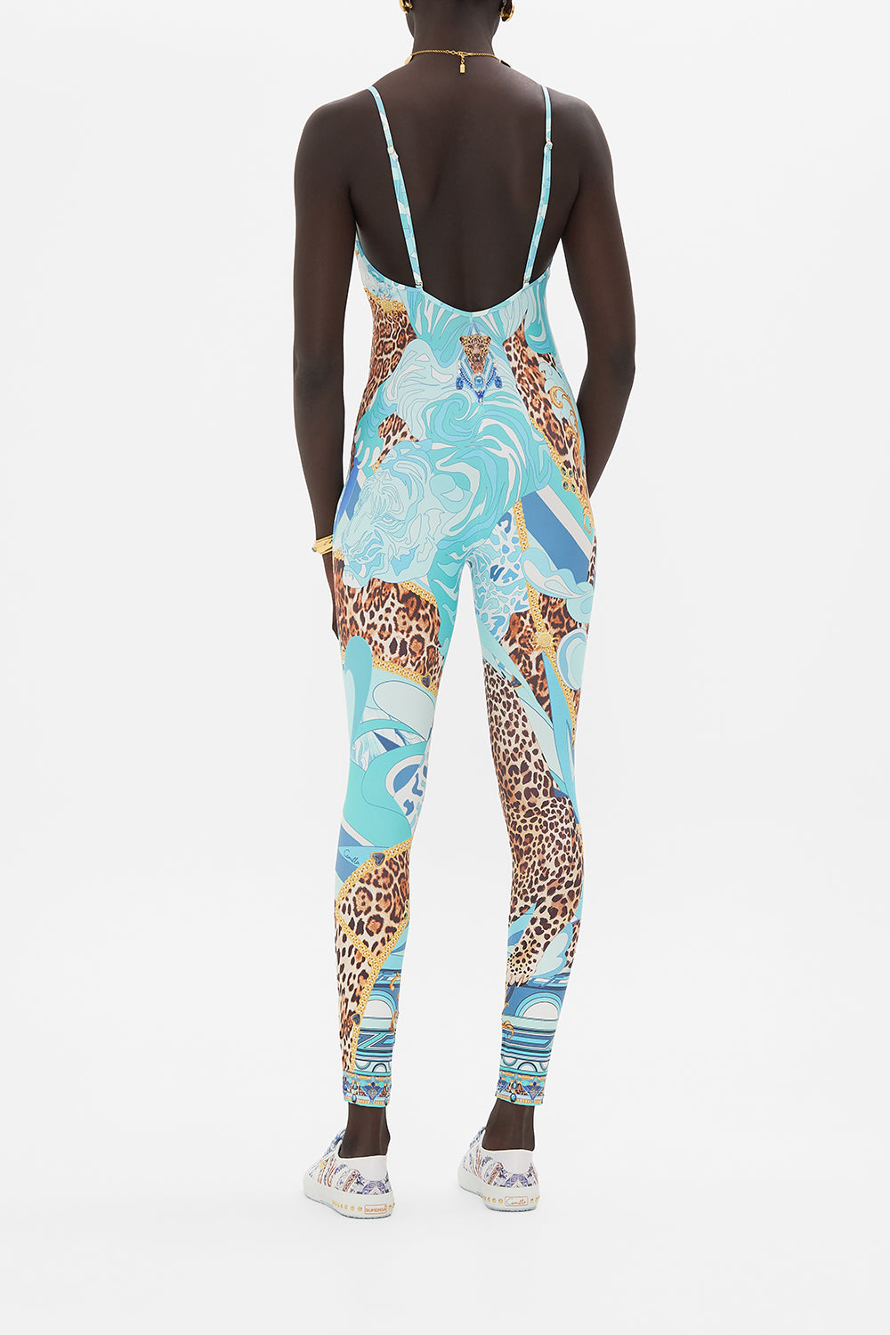 Back view of model wearing CAMILLA designer catsuit in Sky Cheetah print