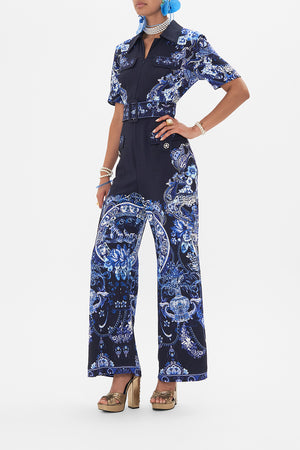 Side view of model wearing CAMILLA jumpsuit in Delft Dynasty print 