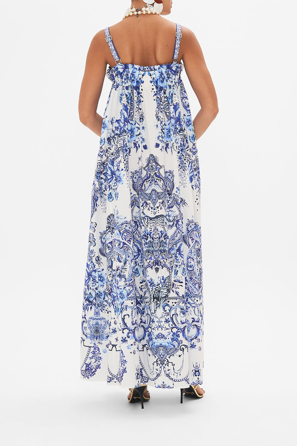 Back view of model wearing CAMILLA blue and white  sun dress in Glaze and Graze print 
