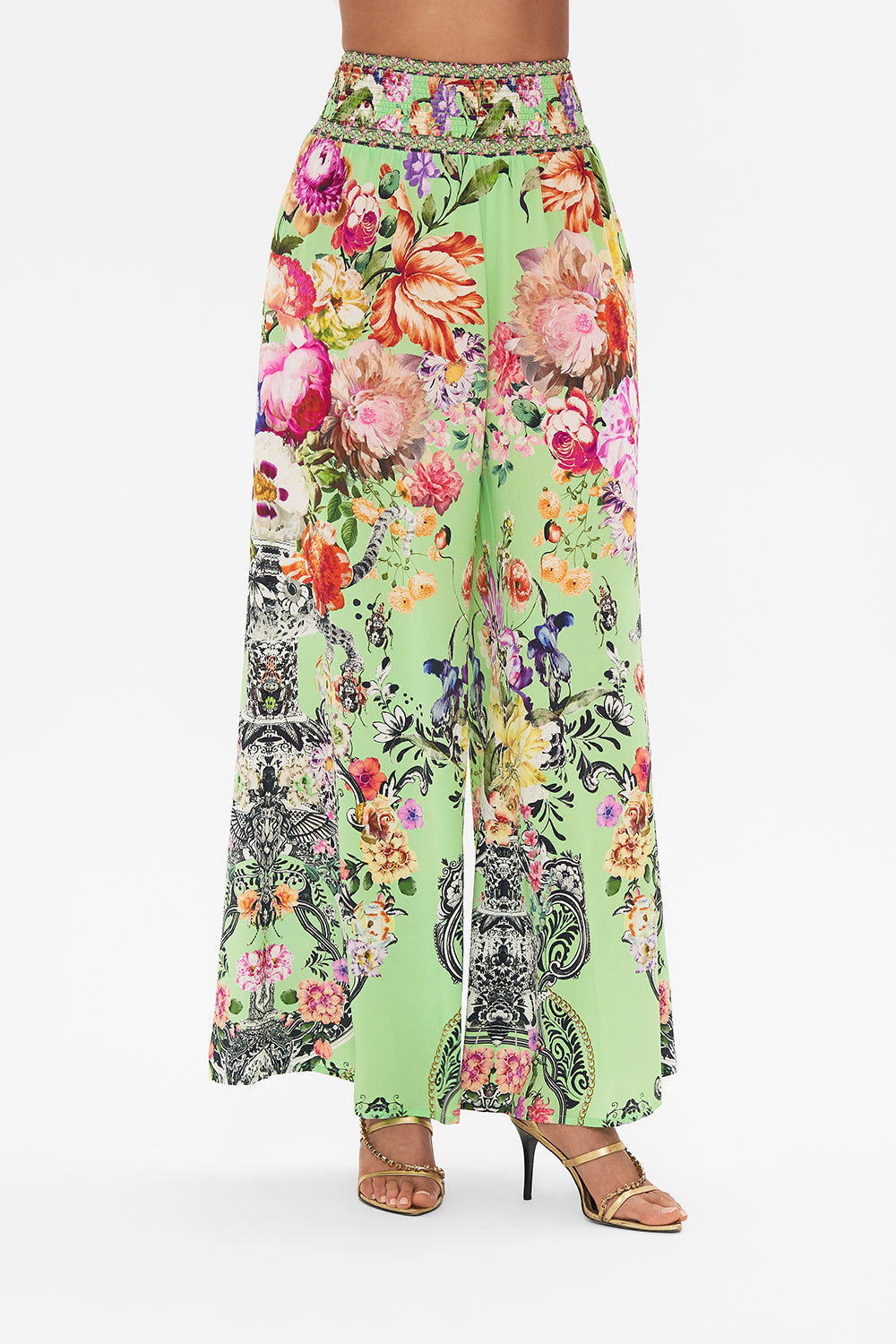 Detail view of model wearing CAMILLA silk shirt dress in Delft Dynasty print