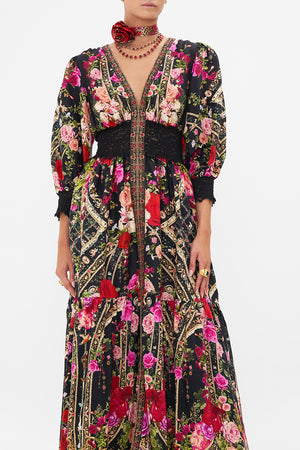 Crop view of model wearing CAMILLA floral maxi dress in Reservation For Love print