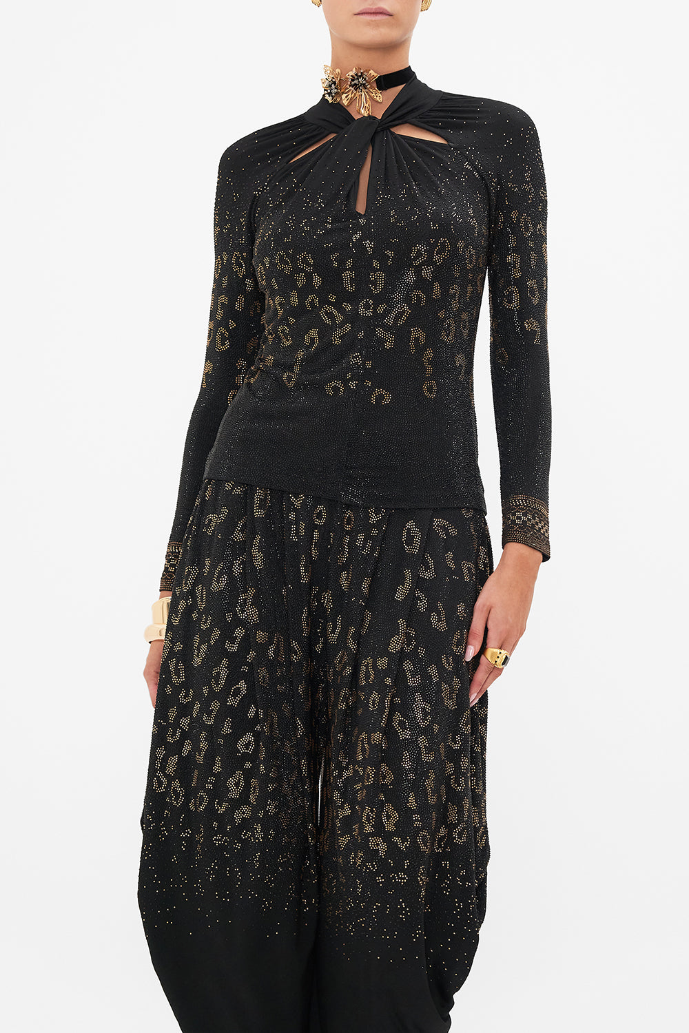 Crop view of model wearing CAMILLA black jersey top in Mosaic Muse