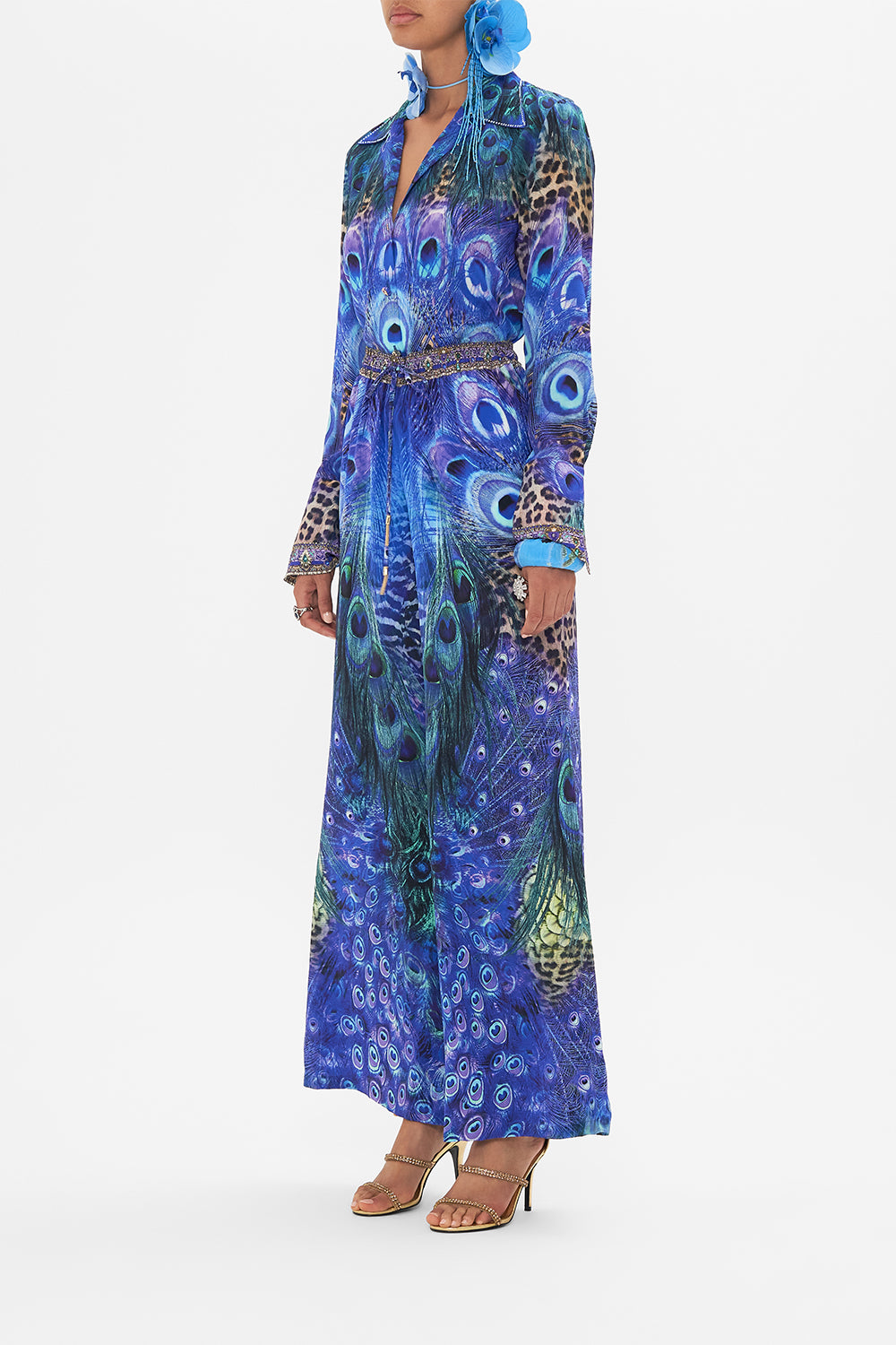 Side view of model wearing CAMILLA silk pants in Peacock Rock print