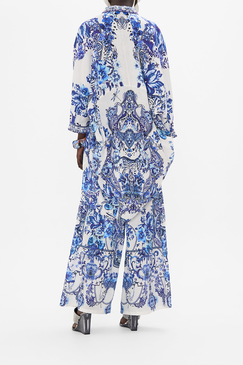 Back view of model wearing CAMILLA silk top in Glaze and Graze print