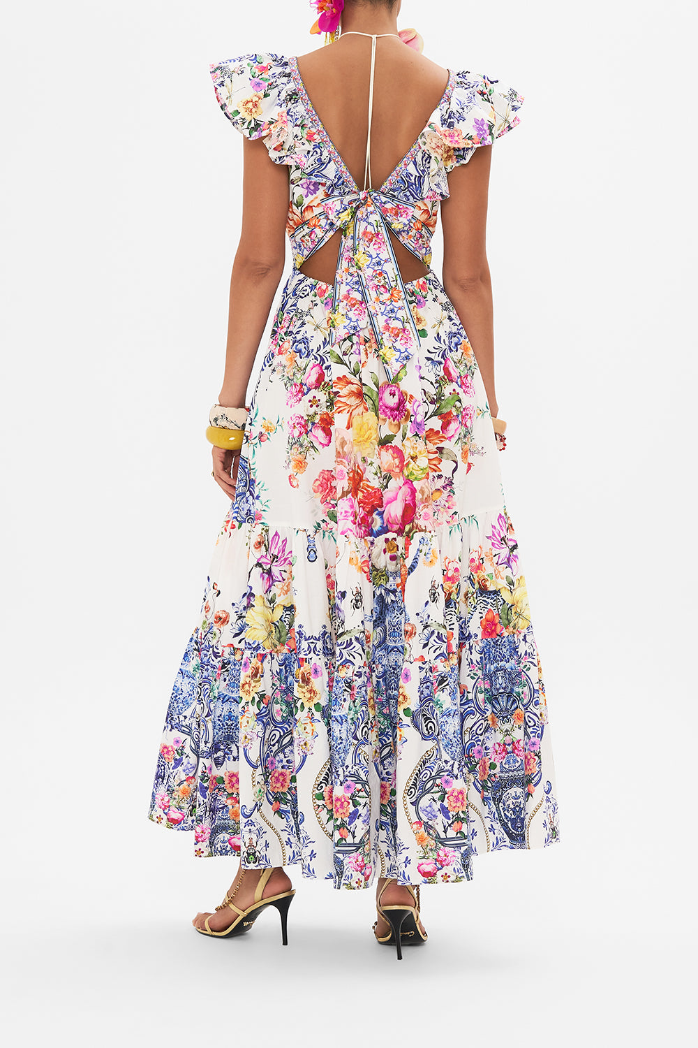 Back view of model wearing CAMILLA silk dress in Dutch is Life print 