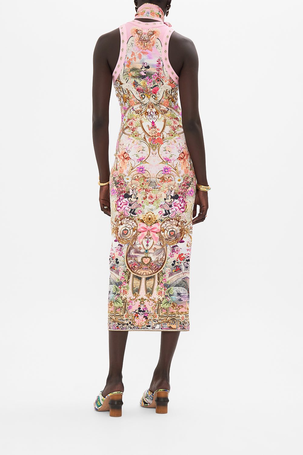 Back view of model wearing Disney x CAMILLA jersey dress in Minnie Mouse Magic print