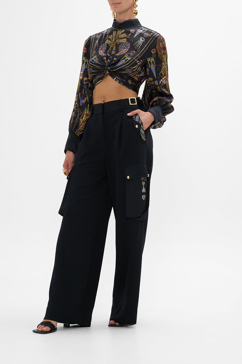 CAMILLA Long Sleeve High Neck Top With Knot Front in Cartouche Kingdom print. 