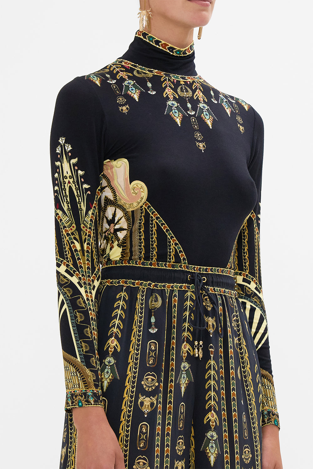 CAMILLA Black/Gold Jersey Turtleneck in They Called Her Nefertari print