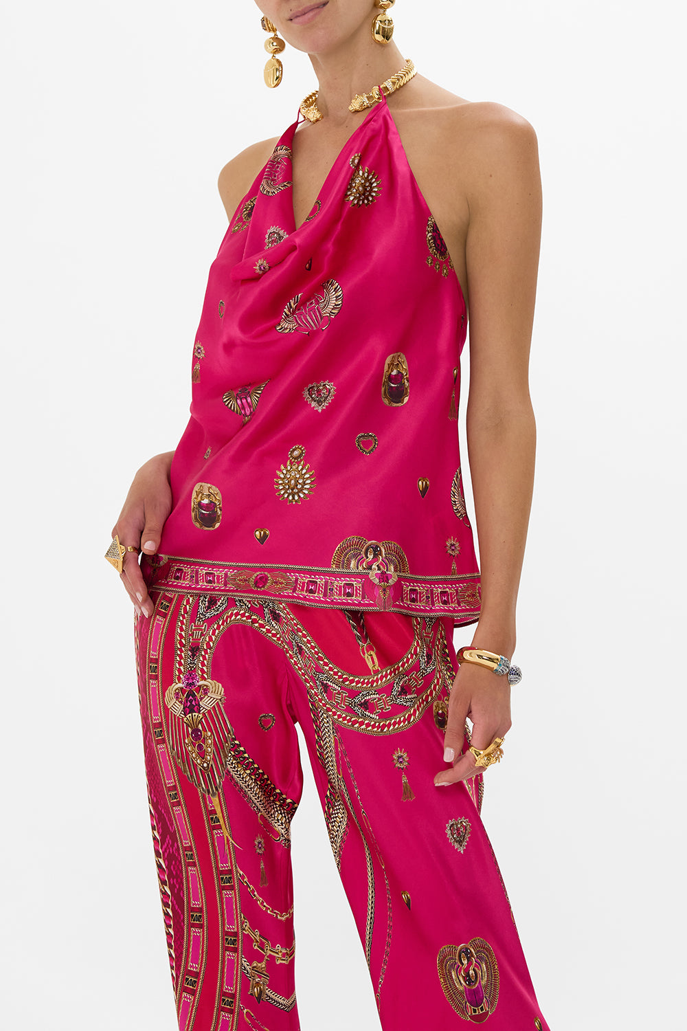 DRAPED TOP WITH HARDWARE KISSED BY A COBRA