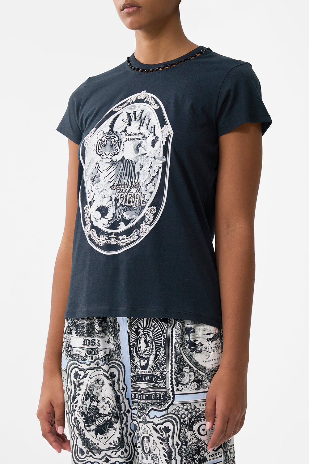 The CAMILLA Slim Fit Round Neck T-Shirt - Black in our Perfumed In Porto print.