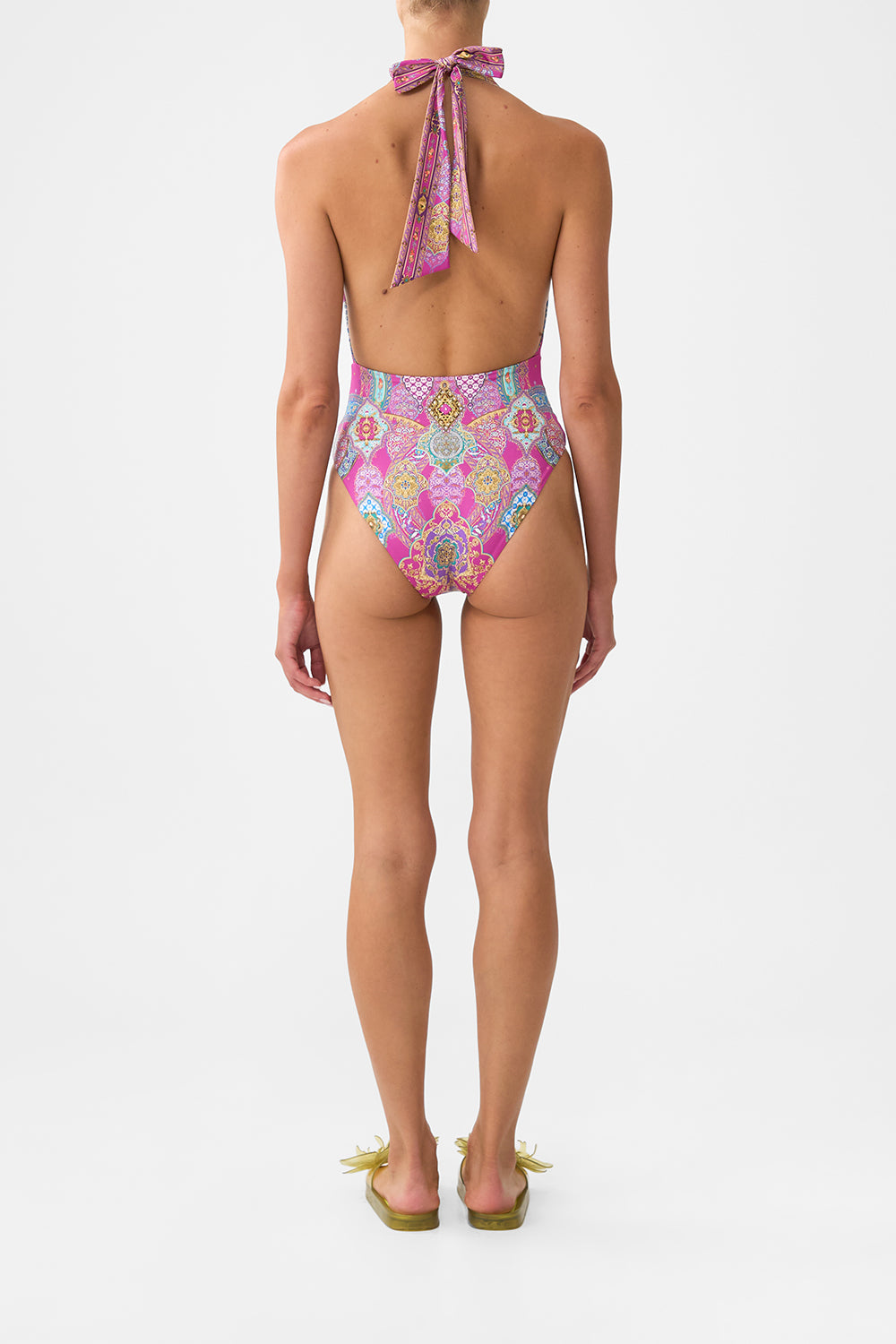 The CAMILLA PLUNGE BACKLESS HALTER ONE PIECE WITH RING TIES CONCUBINES, SULTANS & COURTIERS