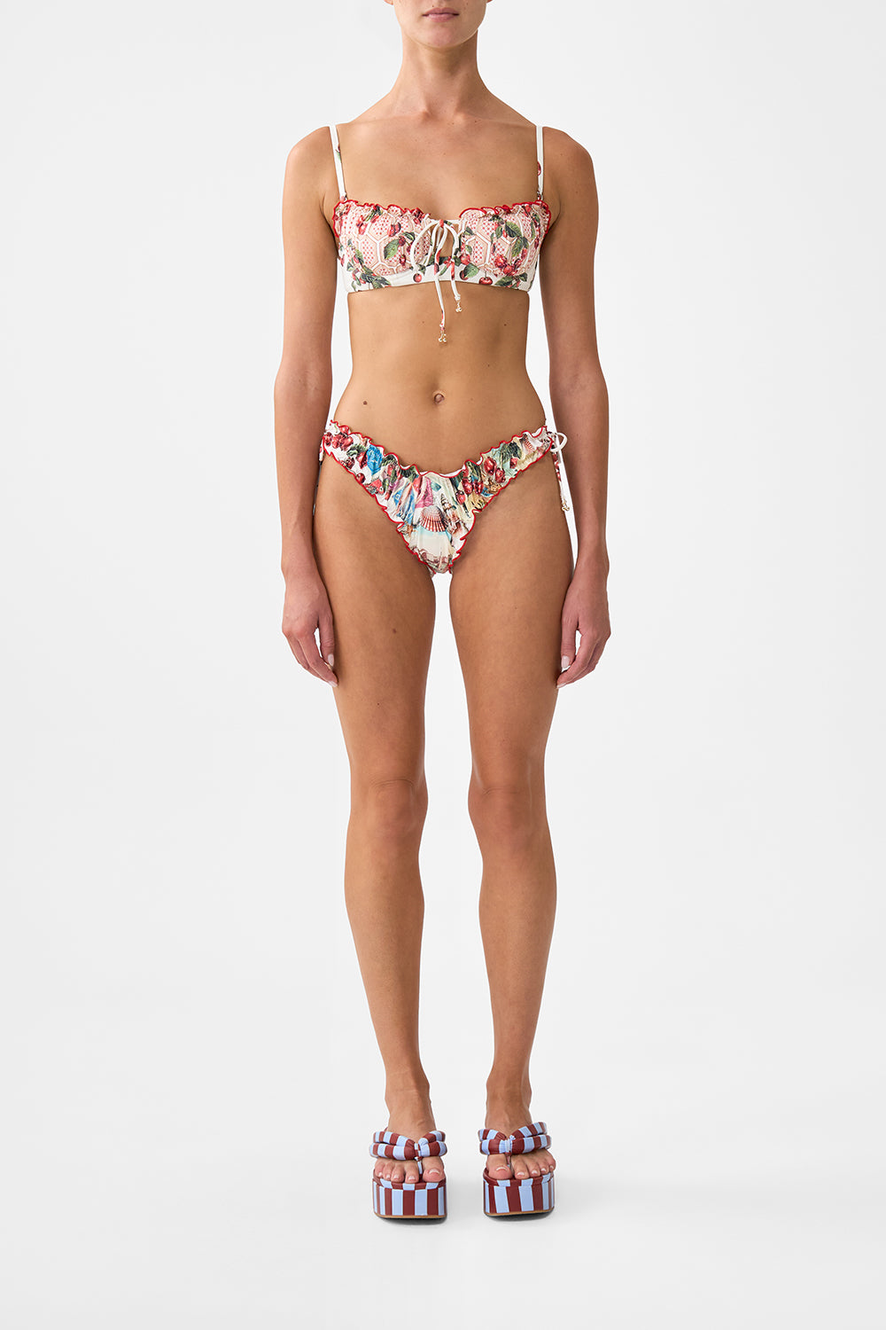 The CAMILLA RUCHED SKIMPY BIKINI BOTTOM WITH TIE SIDES NOTES FROM THE ROADNOTES FROM THE ROAD