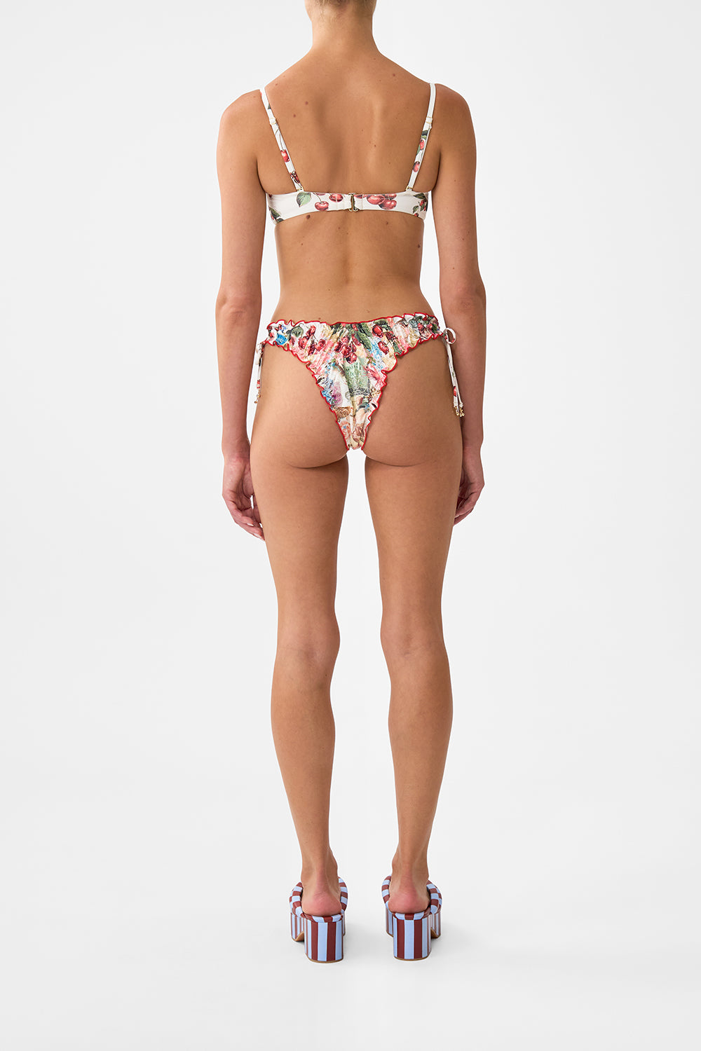 The CAMILLA RUCHED SKIMPY BIKINI BOTTOM WITH TIE SIDES NOTES FROM THE ROAD