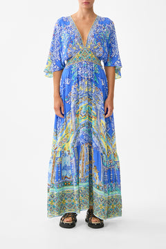 WAISTED DRESS WITH HEM RUFFLE BENEATH THE ANDALUSIAN SUN