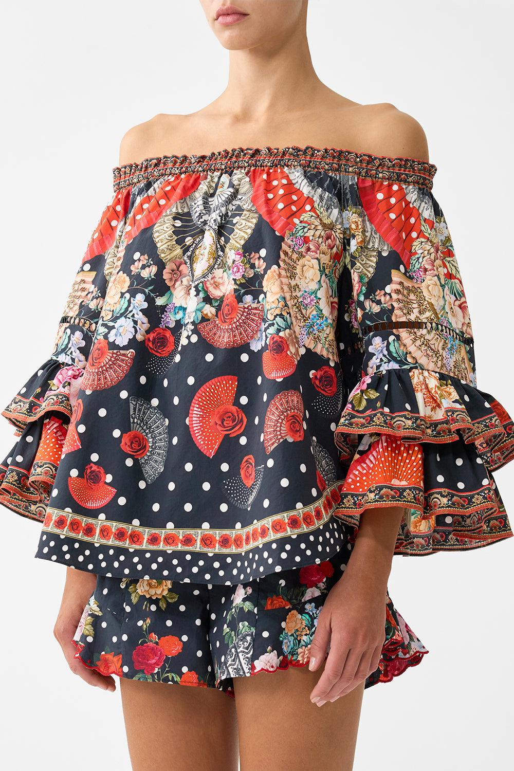 The CAMILLA OFF SHOULDER TOP WITH FRILL SLEEVE DAUGHTERS OF DUENDE