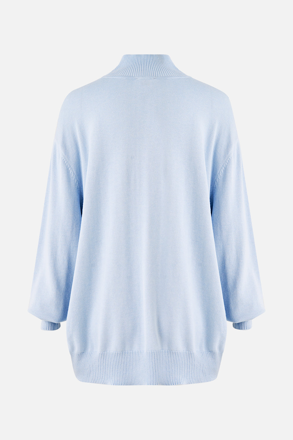 The CAMILLA SILK FRONT TURTLE NECK KNIT THE HUM OF THE ALHAMBRA